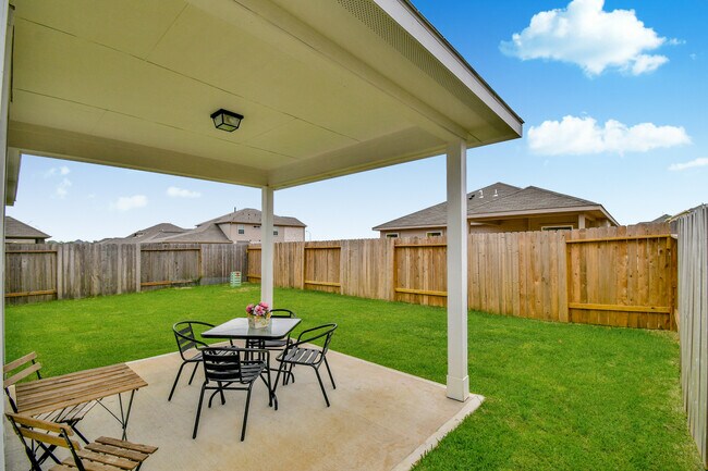 Fully fenced backyard; great for littles and pets - 7847 Grand Louis Way