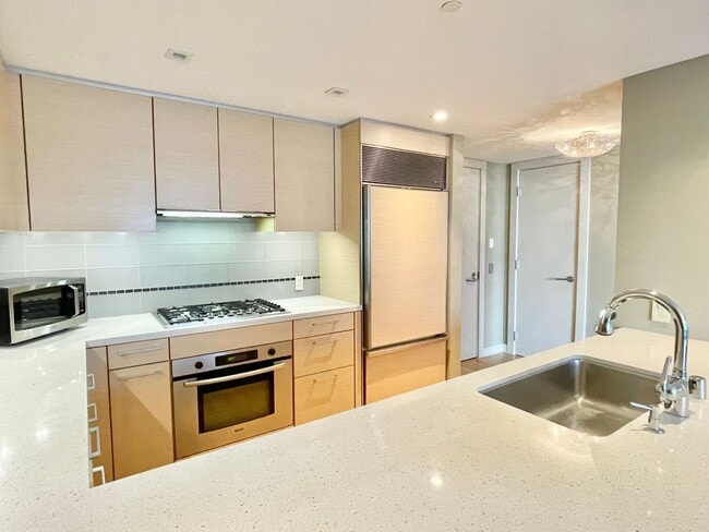 Building Photo - Millennium Stunner! 2BR/2BA 1,245sqft! Pet...