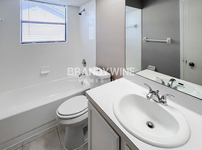 Building Photo - 8592 Bandera Cir W