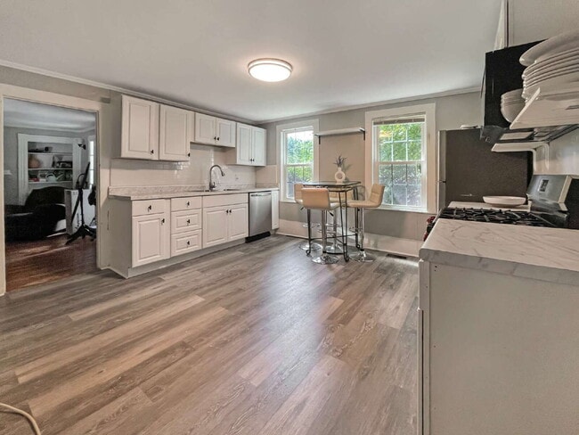 Building Photo - Seeking roommate for a newly updated lower-level unit with a porch and private yard, 1.5 miles fr...