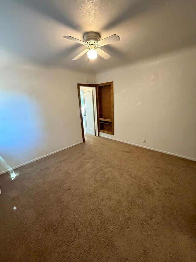 Building Photo - 2 Bedroom with a garage with Large fenced yard!