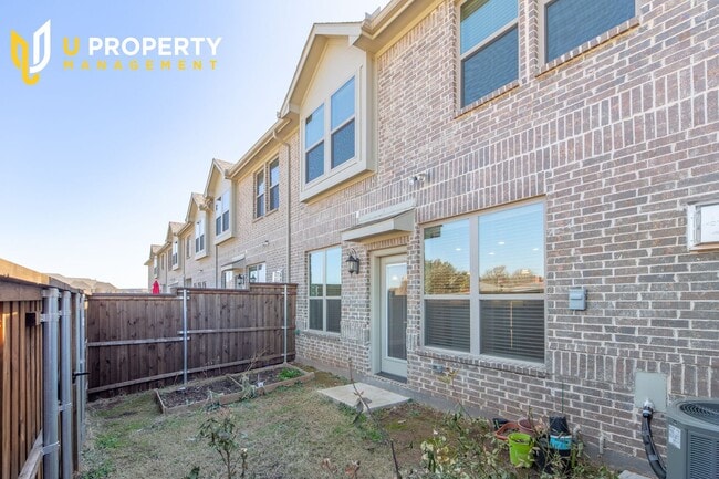 Building Photo - Luxury Townhome- wood flooring. Great location