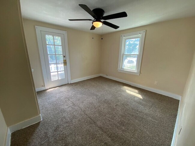 Building Photo - Warm & Bright West Akron 3BR with Fireplace, Off-Street Parking & Backyard