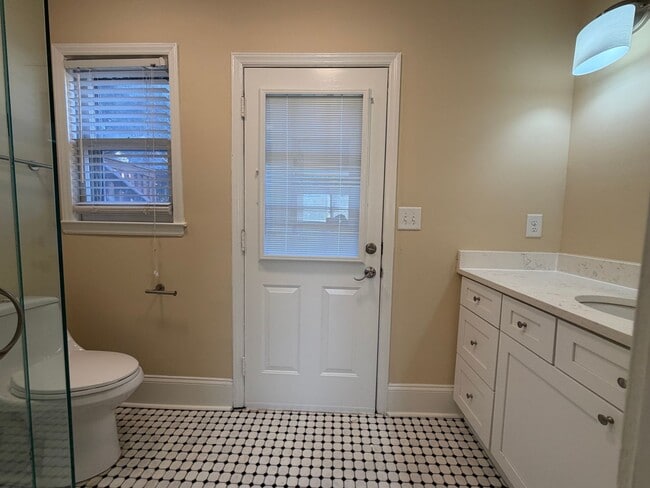 Building Photo - Freshly Painted Split-Level Home with Large Deck & Lawn Care Included