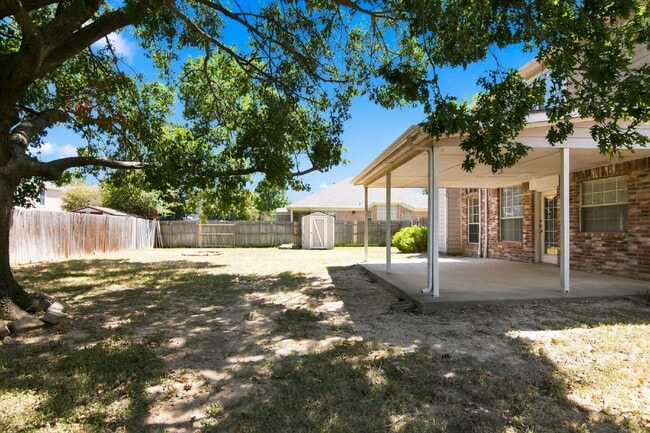 Building Photo - "Spacious Two-Story Home with Multiple Living Spaces and and Expansive Backyard!"