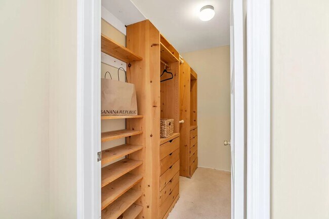 master closet with full built ins - 14024 Peach Grove St