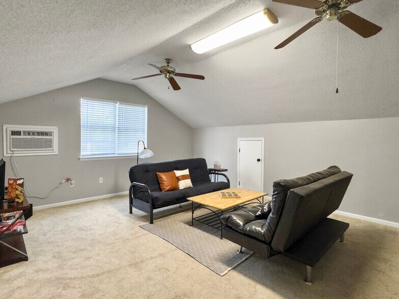 family room over the garage - 7900 Elderberry Cir