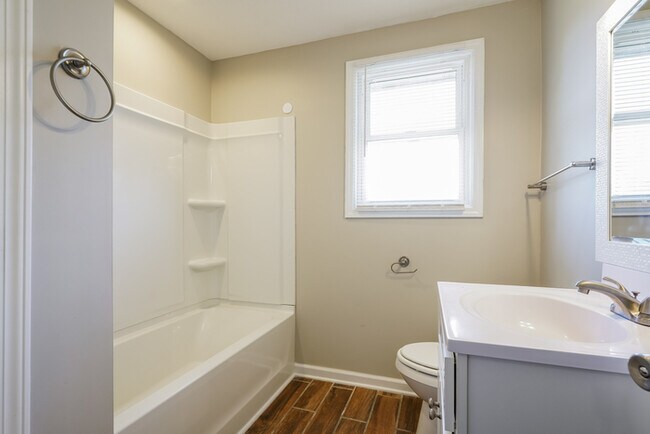 Building Photo - Charming 4-Bedroom Home with Spacious Lawn