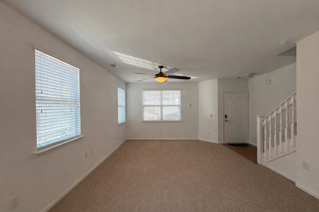 Building Photo - Spacious End-Unit Condo with Dual Primary Suites & Bonus Room