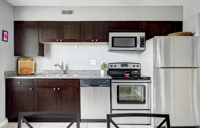 Building Photo - 9440 E Girard Ave