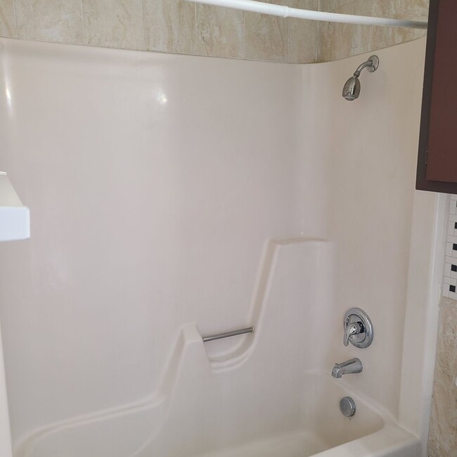 Building Photo - Spacious 2 BR/2.5 bath townhome near the Medical Center w/a fenced in yard!