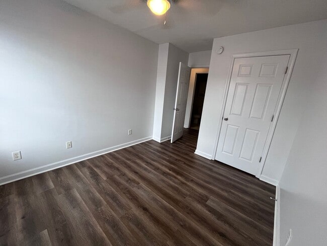 Building Photo - Freshly Painted and New Flooring!