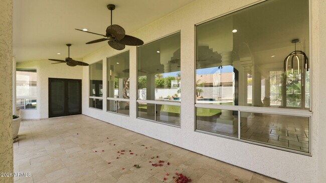 Building Photo - 8638 E Dahlia Dr
