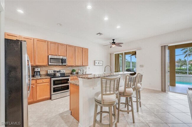 Building Photo - 5583 Lago Villaggio Way