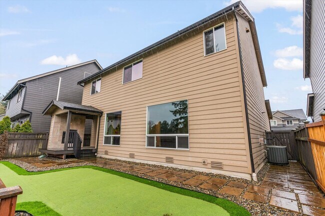 Building Photo - Backyard Putting Green + Outdoor Fireplace | Comfortable Puyallup Rental