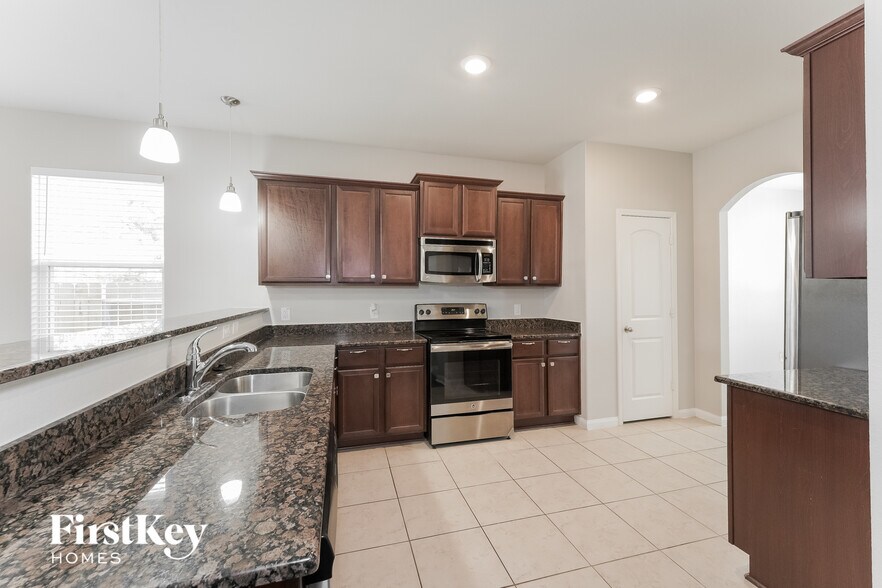 Building Photo - 25069 Authors Dr