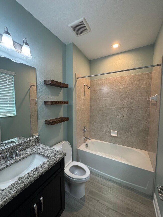 Building Photo - Spacious 5-Bedroom Riverview Home