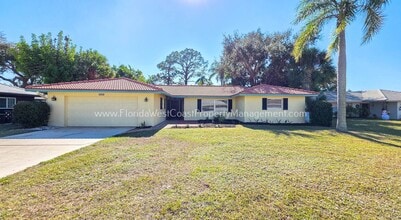 Building Photo - SPACIOUS SARASOTA HOME WITH LARGE FENCED YARD! MOVE IN READY! ALL TILE/ NEW LVP!