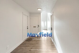Building Photo - Pet Friendly Main Floor 3BD 2BA 2GA Unit Near Costco and High School