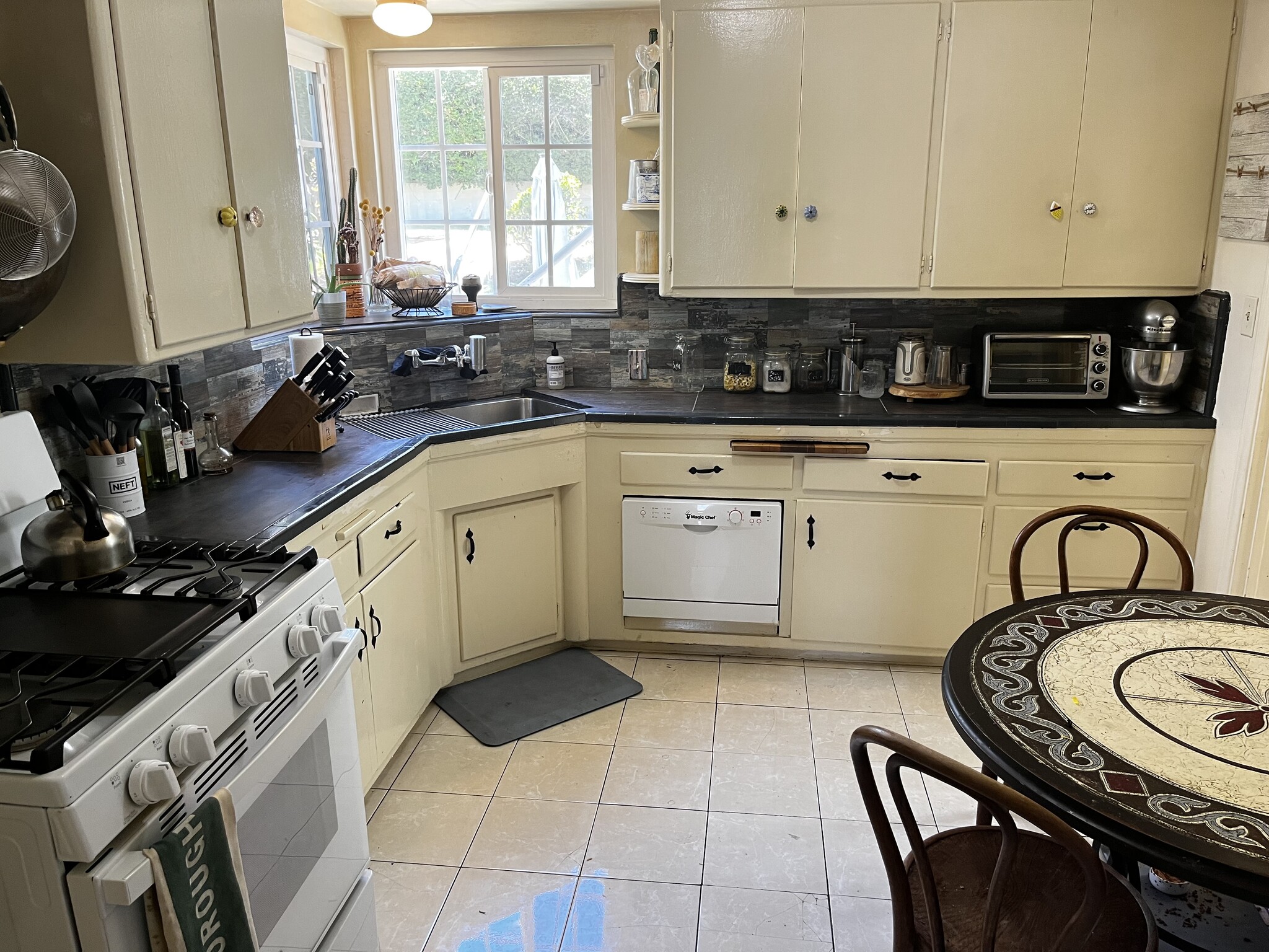 Eat in Kitchen with new appliances - 1706 S Beverly Glen Blvd