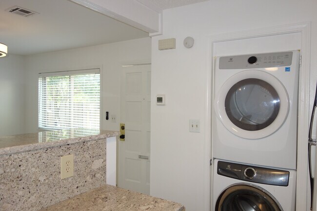 Full size stacked front loading washer/dryer - 3453 E 35th St