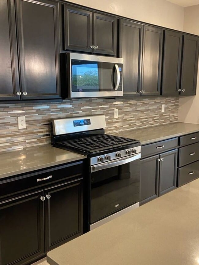 Building Photo - STUNNING NEWER HOME- GATED