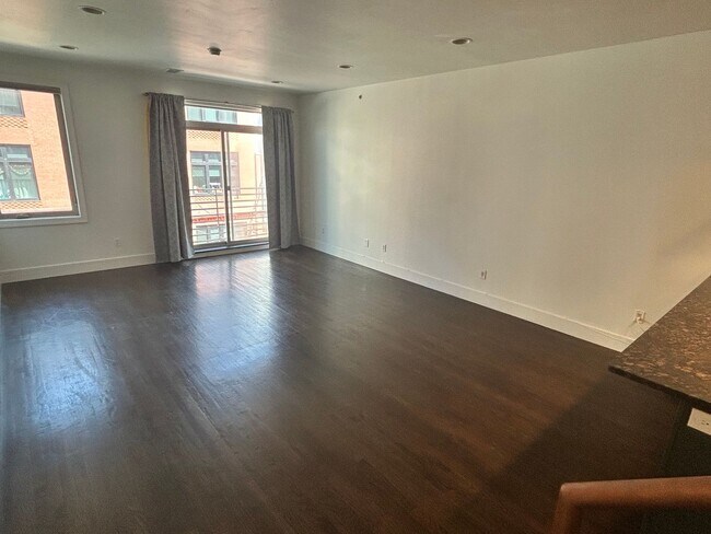 Building Photo - Beautiful Condo with Amazing Roof Top Deck