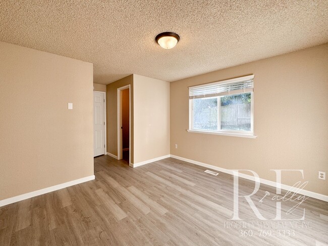 Building Photo - Classic Character Meets Fresh Flooring in ...