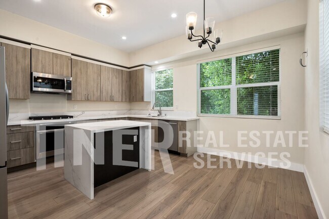 Building Photo - Elegant Modern Living