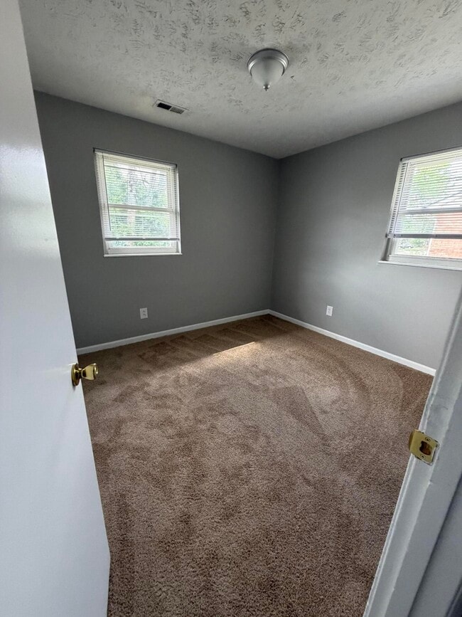 Building Photo - 3732 Red River Dr