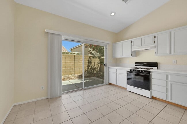 Building Photo - This beautifully updated 2-bedroom home is nestled in a gated community