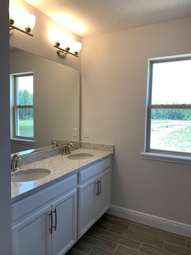 Building Photo - SPECTACULAR MODERN HOME!!Relaxing water views from the back of this beautiful home- MOVE IN Septe...