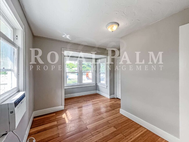 Building Photo - Deck the halls or the French doors, because this charming century-old single family home is avail...