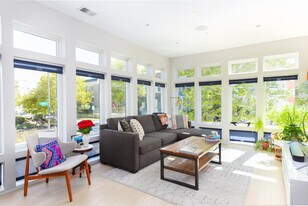 Living space with tons of light (custom shades from The Shade Store). - 1001 Monroe St NW