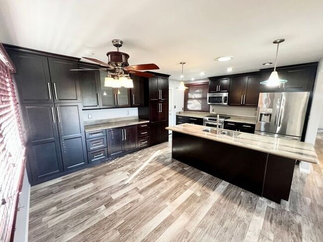 Building Photo - Charming 3BR/2BA Home with Pool, Remodeled Kitchen & Backyard Oasis