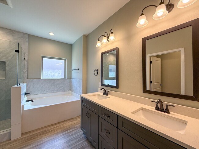 Building Photo - Spacious 3 Bedroom 2 Bath + Office with Split Floor Plan & Screened Patio in Pace!