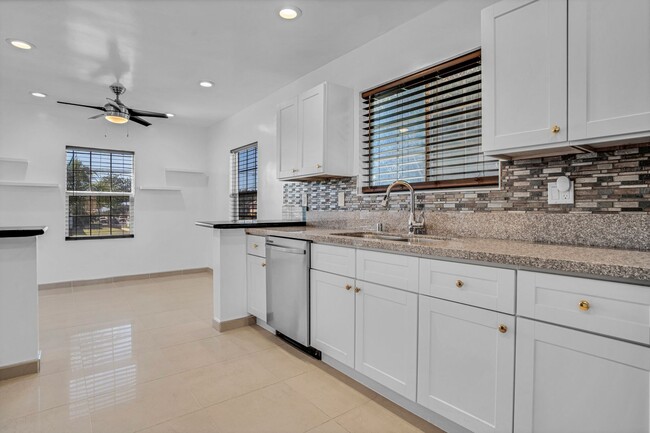 Building Photo - Stunning Remodeled Corner-Lot Home – An En...