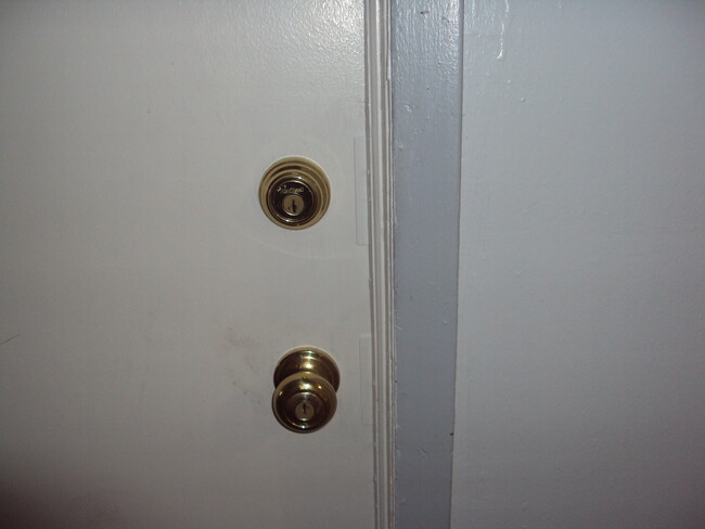 Solid wood kick in proof doors same key fits dead bolt and knob lock - 218 NW College Ave