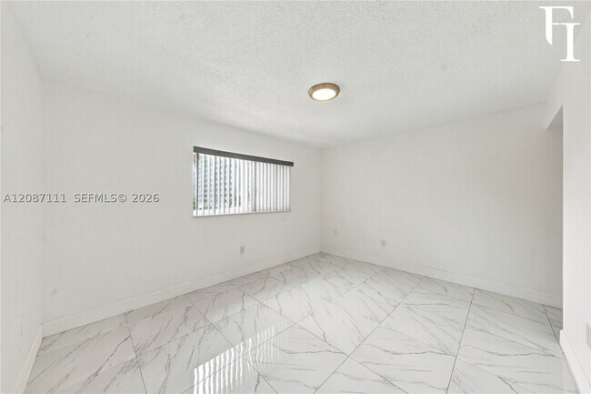 Building Photo - 6965 Harding Ave