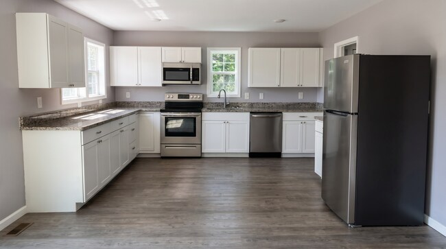 Building Photo - Renovated 2-Bedroom Home with Two Baths and Expansive Deck