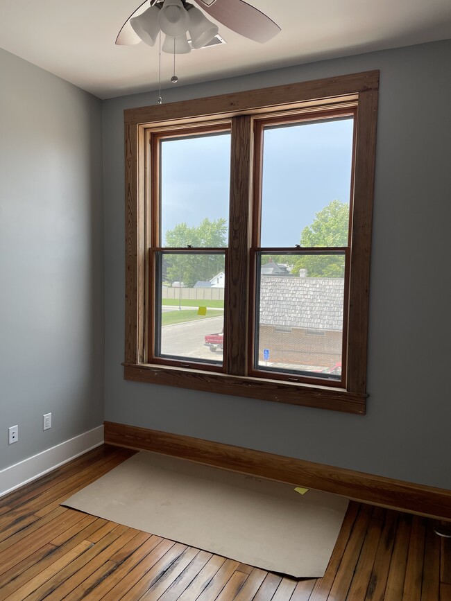 Bedroom looking out the front of the building (viewing north). - 204 E Broadway Ave