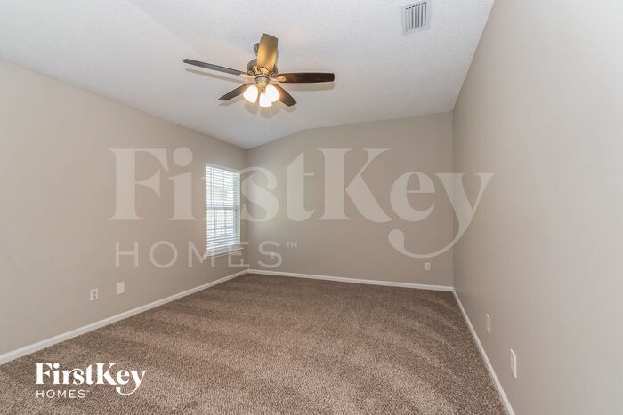Building Photo - 7444 Lake Plantation Ln
