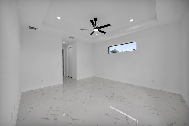 Building Photo - Brand-New Pool Home for Rent – Port Charlo...