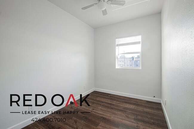 Building Photo - 1847 1/2 W Florence Ave