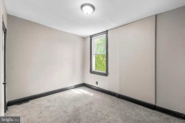 Building Photo - Three Bedroom One Bath Corner Property Rea...