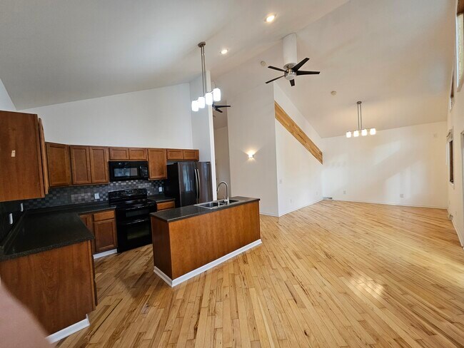 Great room, kitchen and living room viewgreat room, kitchen and living room view area view - 4301 Quaker Trl NE