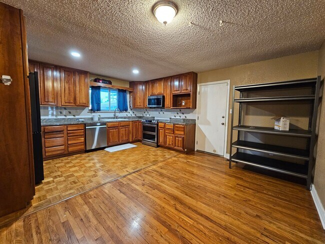 Building Photo - 4-Bedroom Home with In-Ground Pool, Solar ...