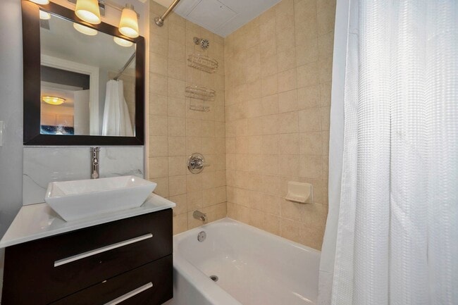 Building Photo - Available Now! Electric, Gas and Water included in Rent! Spacious Studio in an Amenity Rich Build...