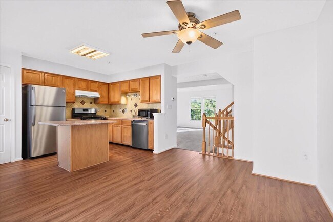 Building Photo - 3BR Townhome in Russett | 3 Levels | Walkout Basement + Deck | $2,400/mo** Beautiful 3-level town...