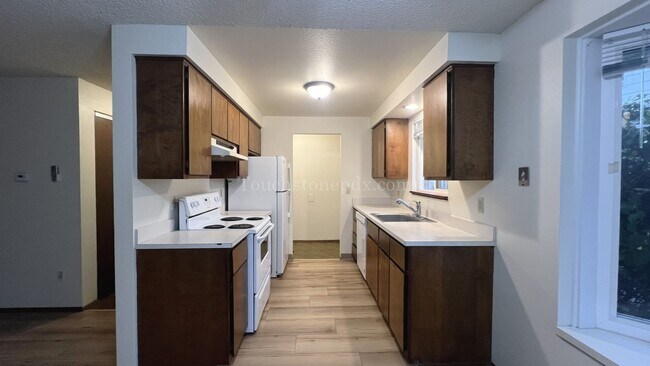 Building Photo - Updated 2 Bedroom Featuring New Plank Flooring